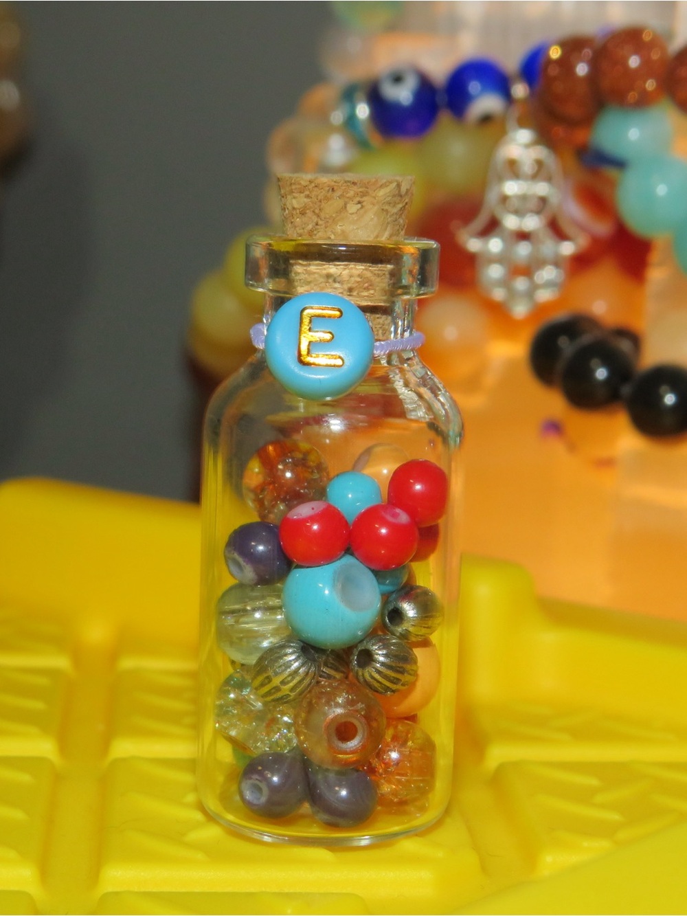 Initial E potion bottle